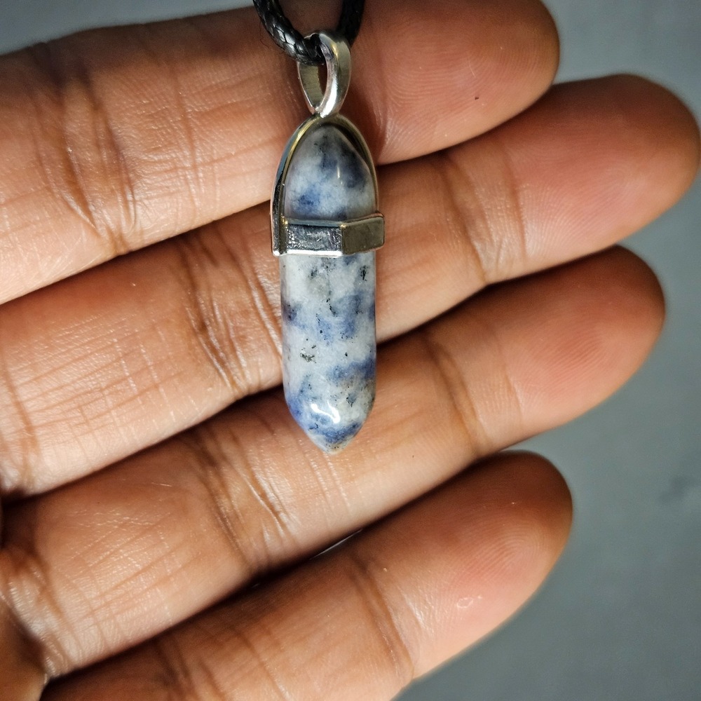 Crystal Point Pendant Silver-tone metal bail on a black cord necklace adjustable